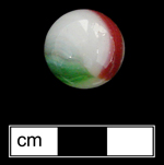 18QU124 - Machine made glass marble Patched marble.  Late 1920s-mid-1950s (Randall and Webb 1988:43). Two patches of different colors, generally on an opaque white body - click image to see larger view.